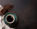 Coffee,Cup,And,Beans,On,Old,Kitchen,Table.,Top,View